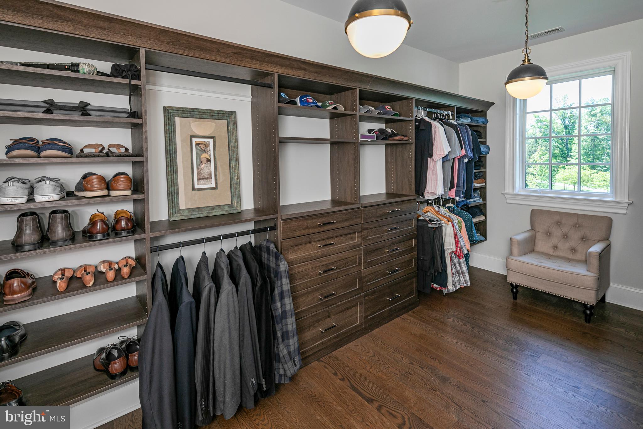 280 Carter Road Princeton, NJ 08540 - Photo 36 of 79 a view of walk in closet with clothes and shoes