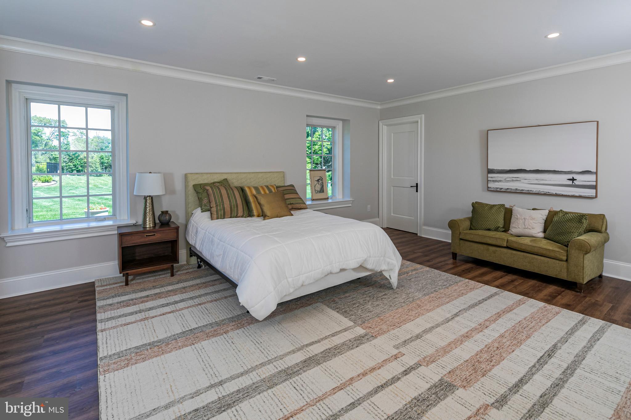 280 Carter Road Princeton, NJ 08540 - Photo 55 of 79 a spacious bedroom with a bed and a couch