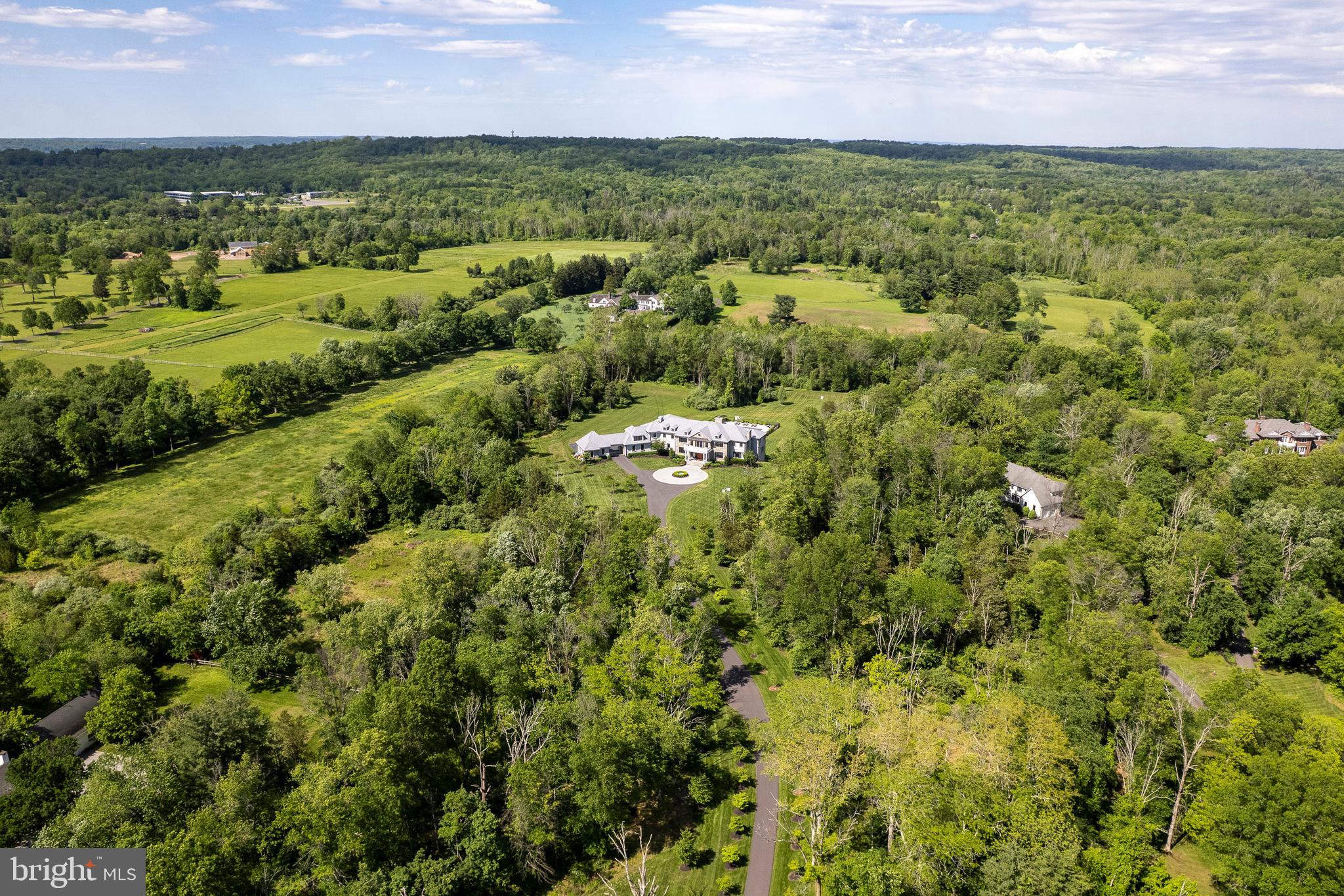 280 Carter Road Princeton, NJ 08540 - Photo 70 of 79 a view of a city with lush green forest