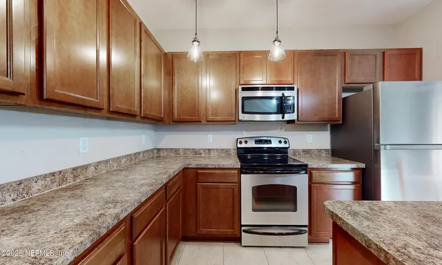 $224,900 | 4220 Plantation Oaks Boulevard, Unit 1811, Orange Park, FL 32065