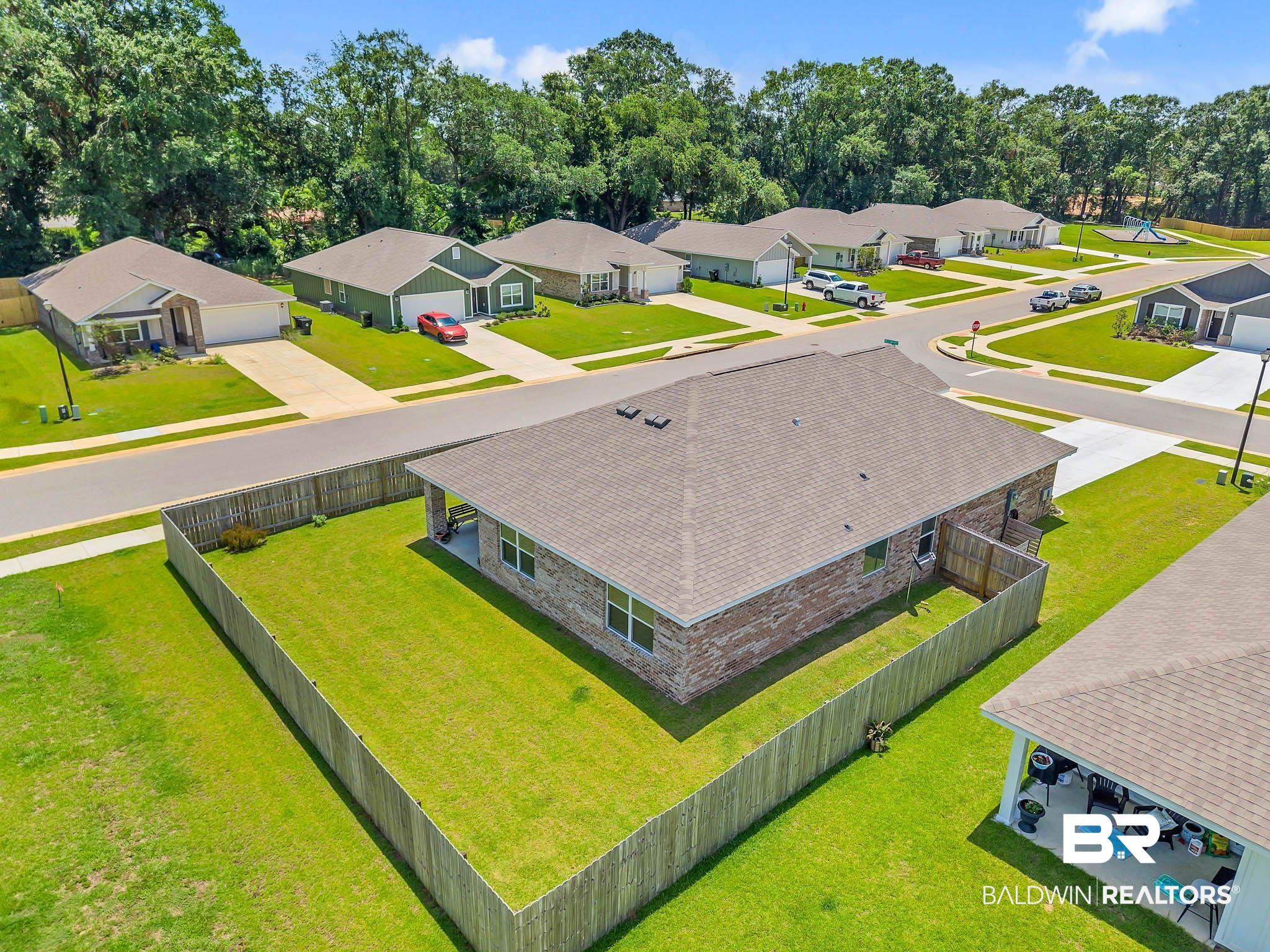 17217 REFLECTION Street Loxley, AL 36551 - Photo 67 of 83 Aerial perspective of suburban area