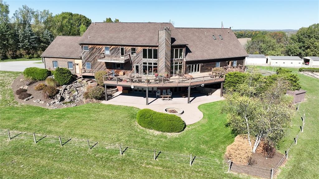 166 McKay Road Saxonburg, PA 16056 - Photo 6 of 48 a aerial view of a house with table and chairs in patio