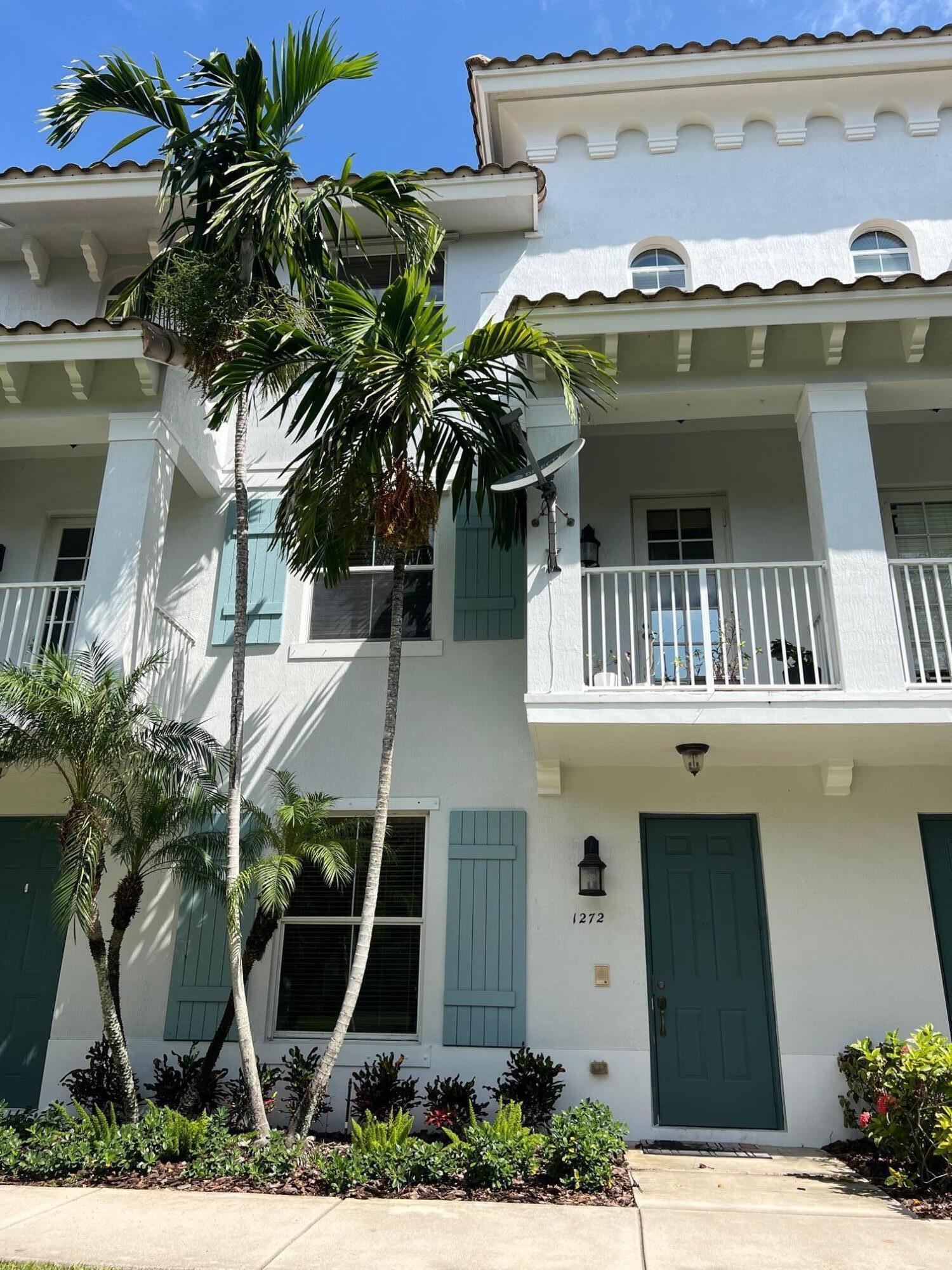 a front view of a house with balcony