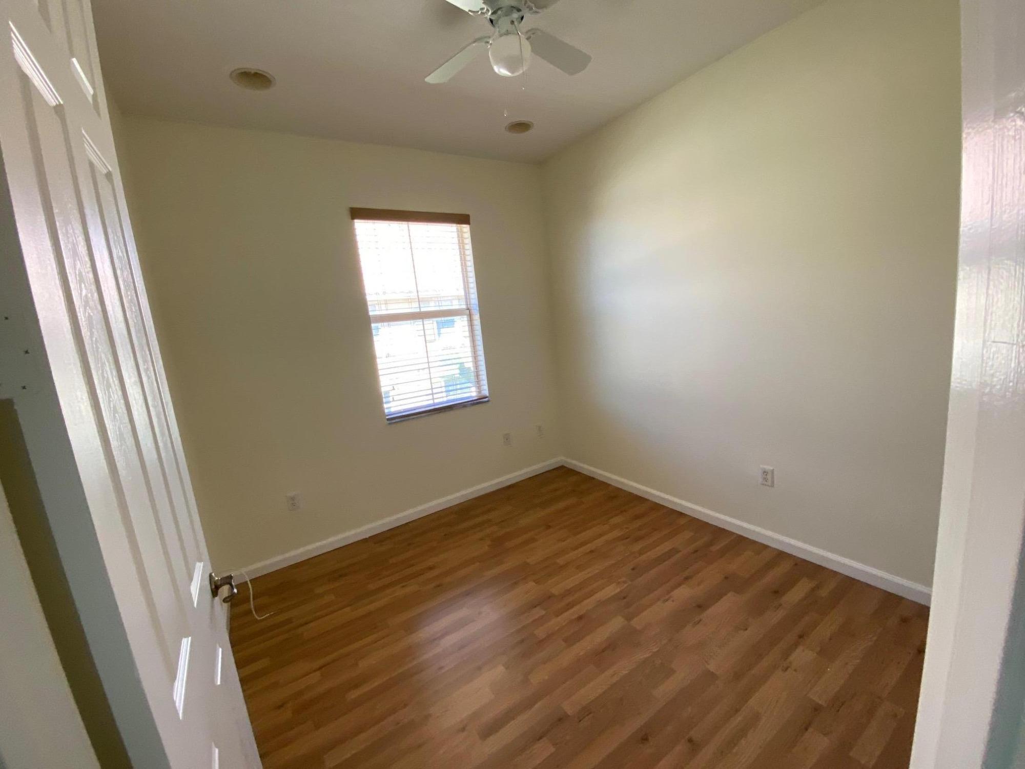 1272 Via Fiume Boynton Beach, FL 33426 - Photo 14 of 51 an empty room with a window