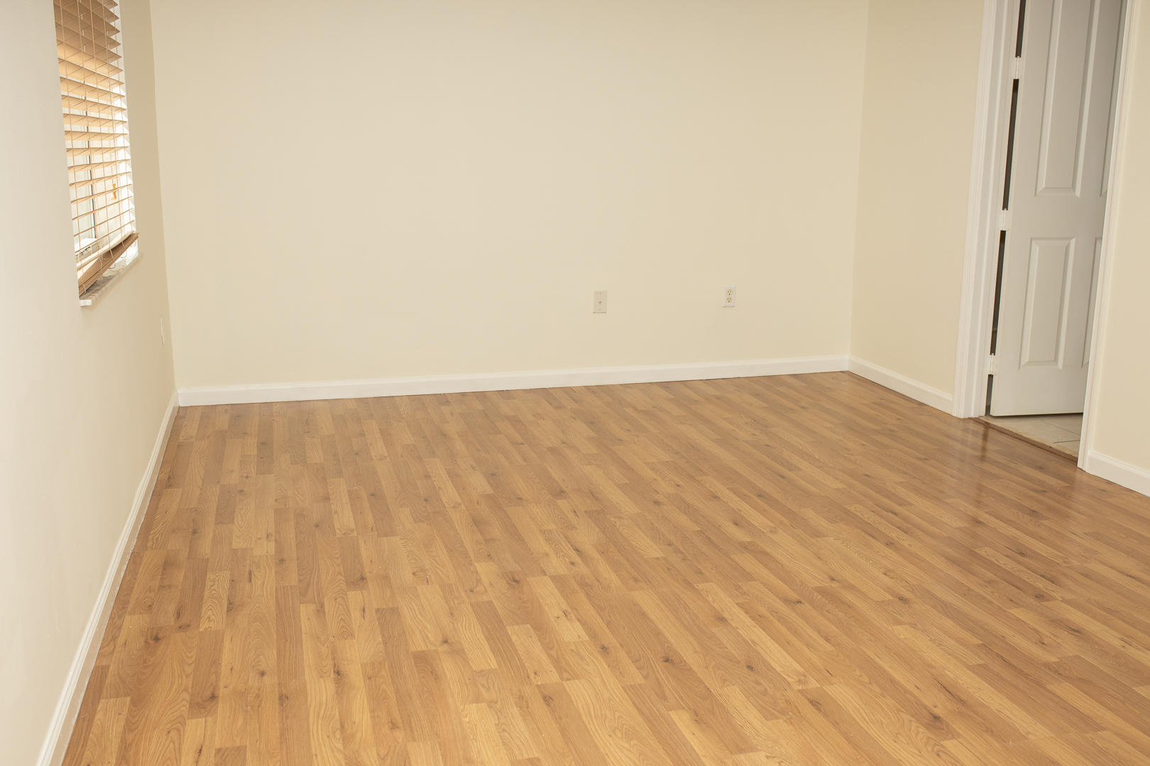 1272 Via Fiume Boynton Beach, FL 33426 - Photo 22 of 51 a view of room with wooden floor and bench