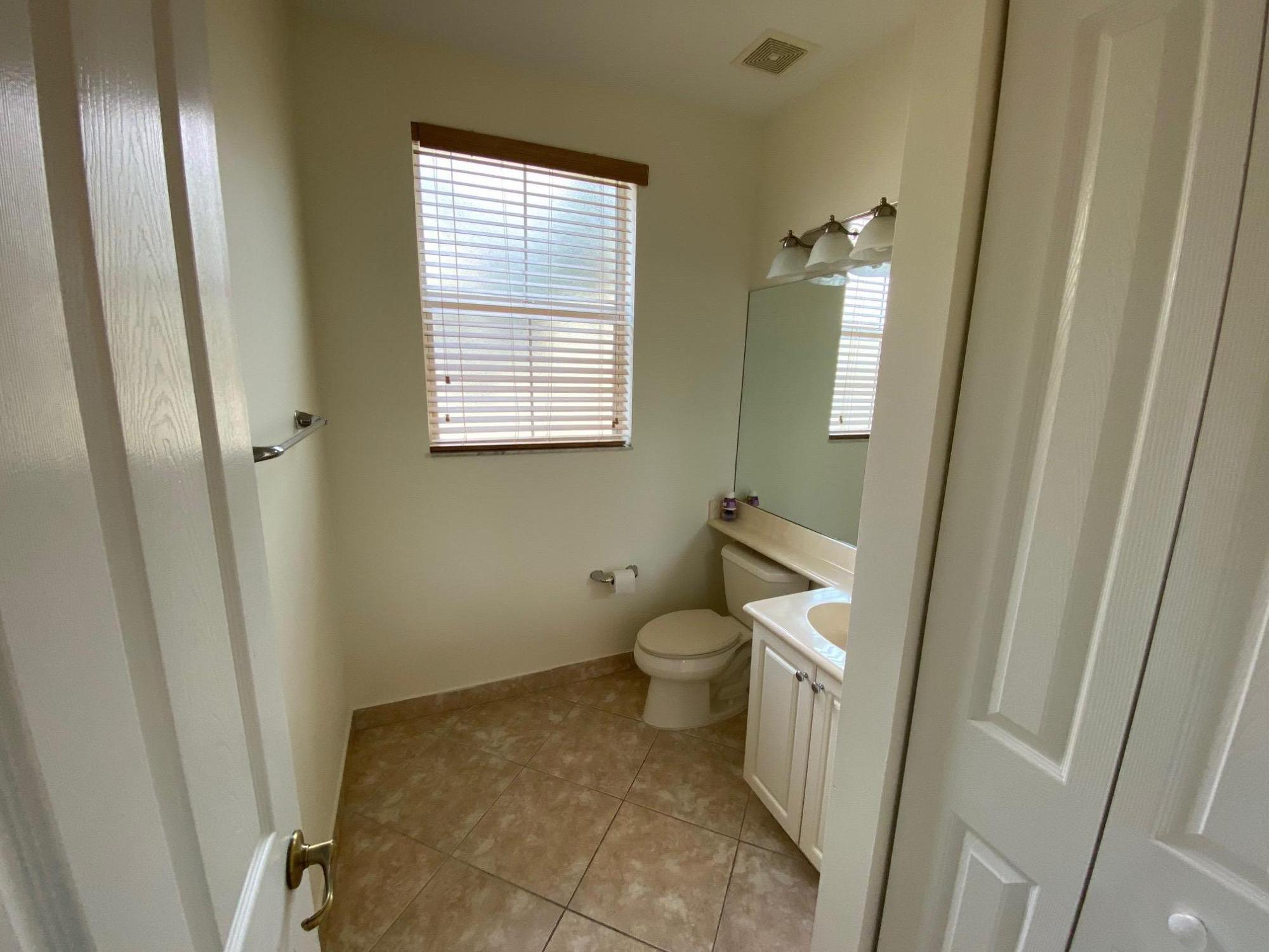 1272 Via Fiume Boynton Beach, FL 33426 - Photo 32 of 51 a bathroom with a sink and toilet