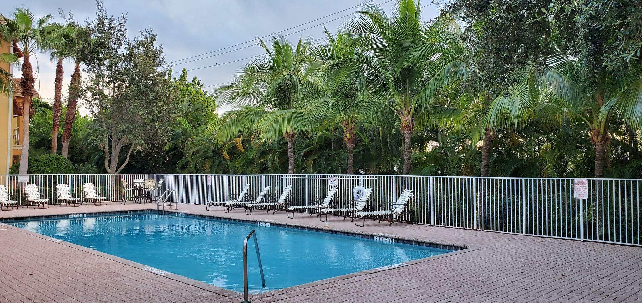 1272 Via Fiume Boynton Beach, FL 33426 - Photo 48 of 51 a view of a swimming pool with a patio