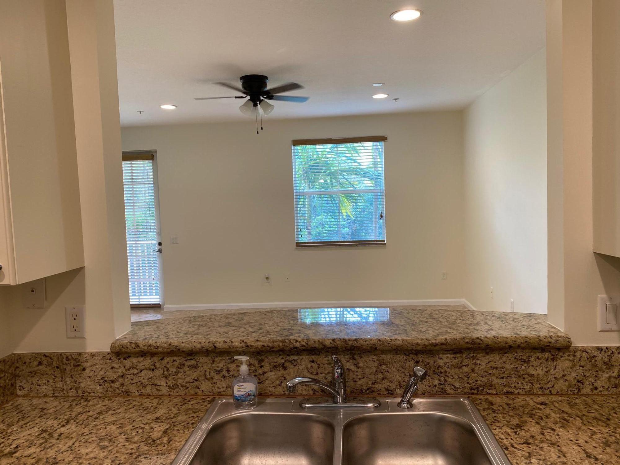 1272 Via Fiume Boynton Beach, FL 33426 - Photo 5 of 51 a bathroom with a granite countertop sink and a mirror