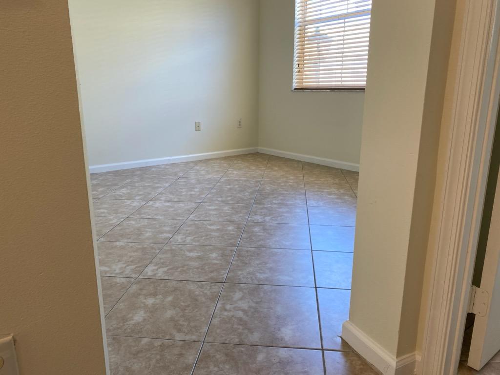 1272 Via Fiume Boynton Beach, FL 33426 - Photo 8 of 51 a bathroom with a window