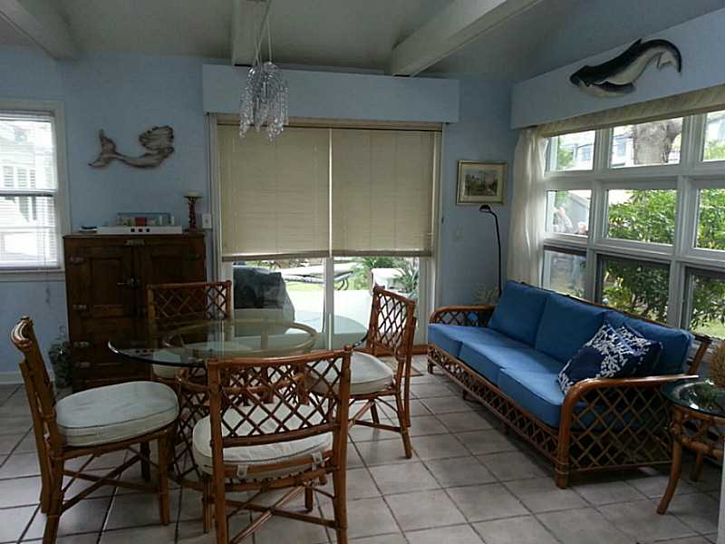 4 Standish Road Jamestown, RI 02835 - Photo 6 of 13 Dining Area. Dining Area with Slider to Large Deck with Nice Privacy.