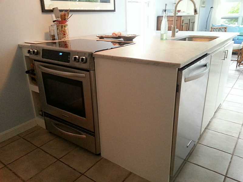 4 Standish Road Jamestown, RI 02835 - Photo 8 of 13 Kitchen. New SS Appliances: Slide in Range, Bottom Freezer Refrigerator, Dishwasher and Garbage Disposal