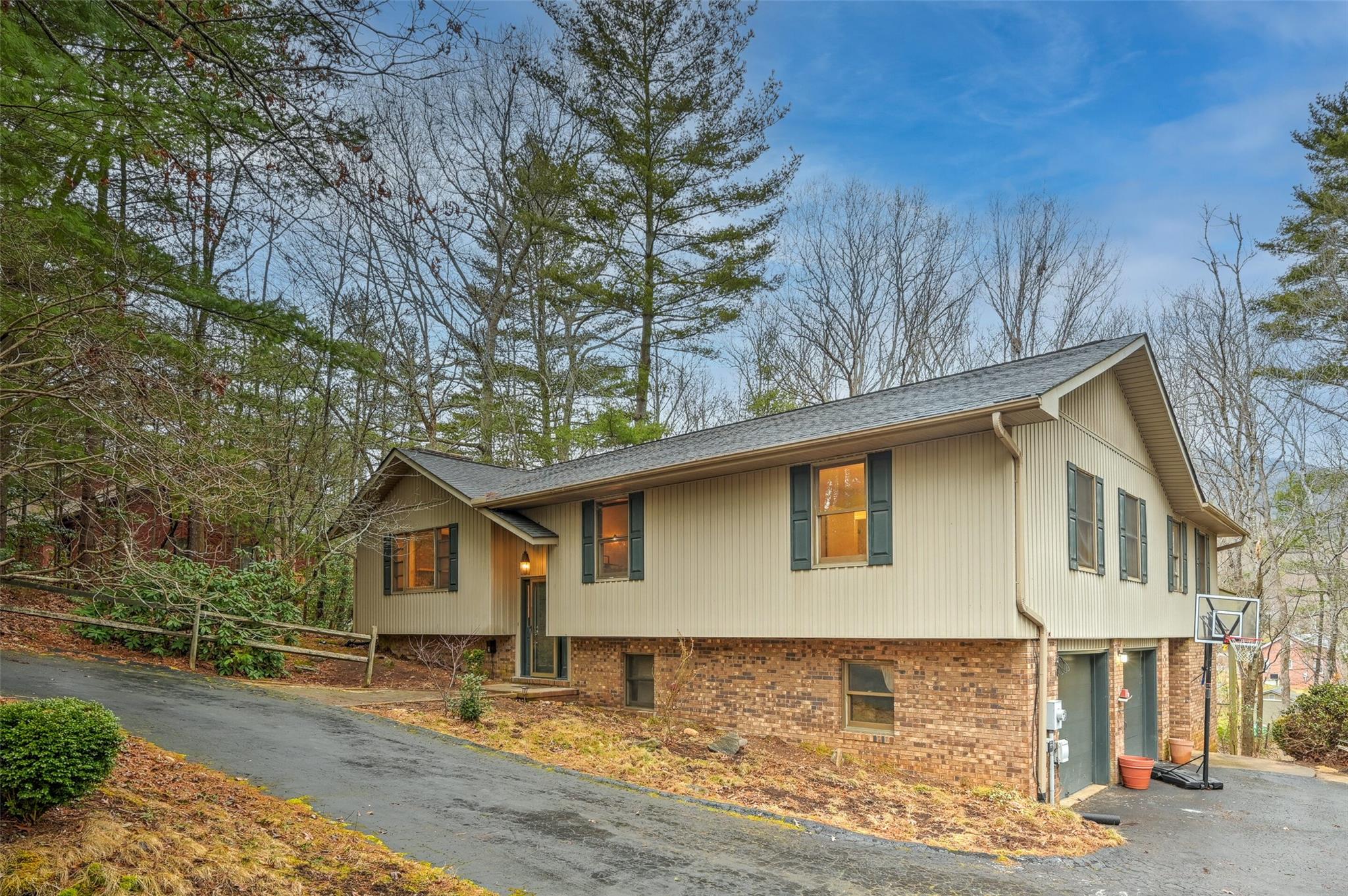 a front view of a house with yard
