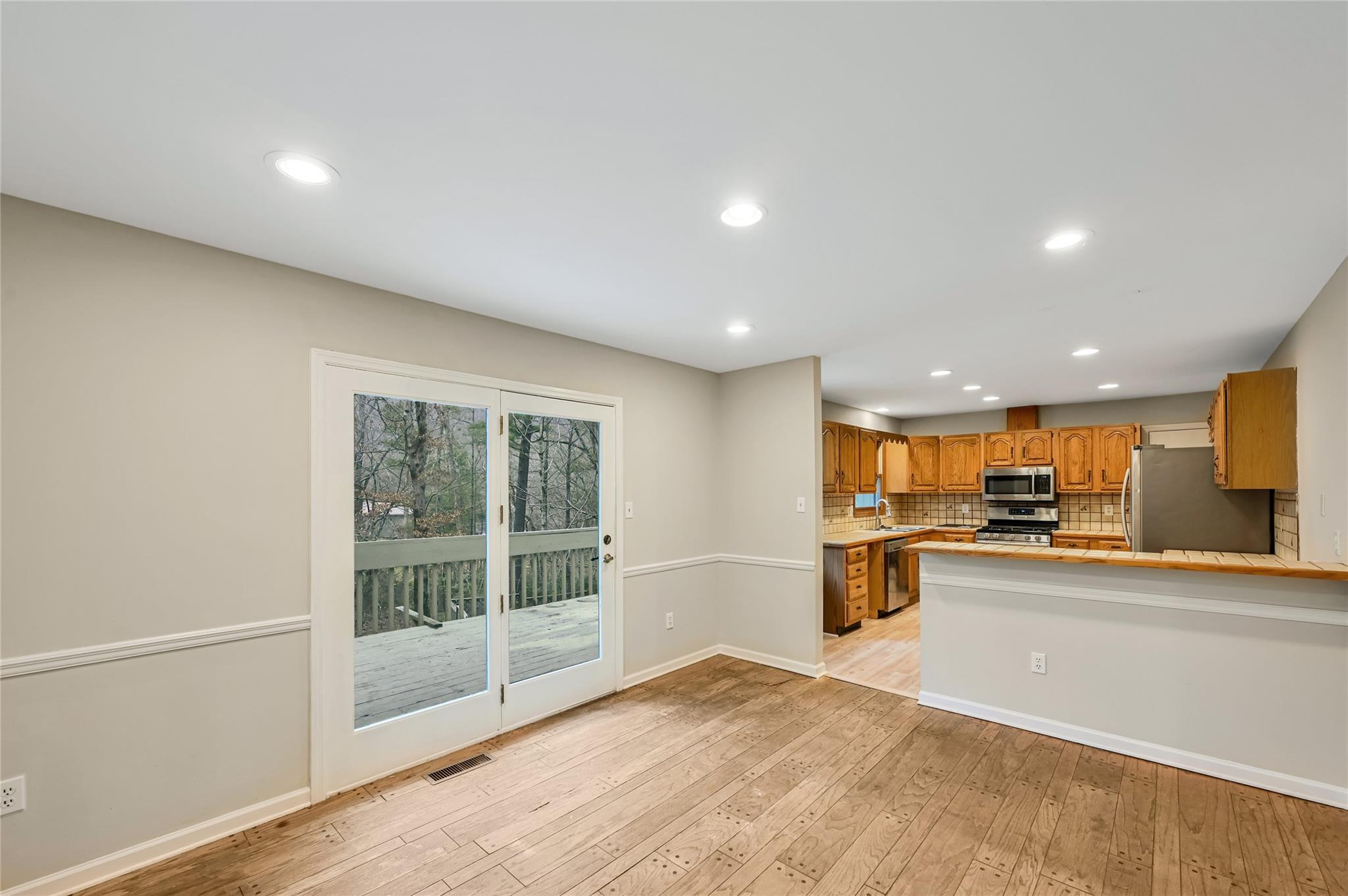 209 Riva Ridge Drive Fairview, NC 28730 - Photo 4 of 23 a view of a kitchen with a sink and cabinets