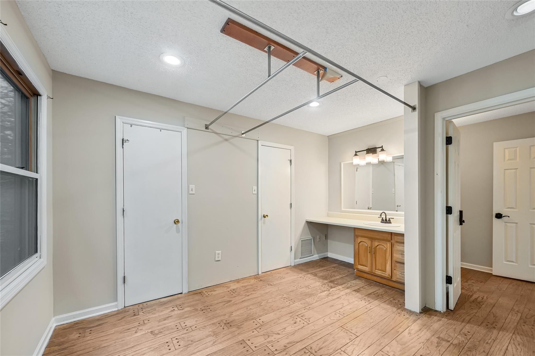 209 Riva Ridge Drive Fairview, NC 28730 - Photo 9 of 23 a view of a kitchen from a hallway