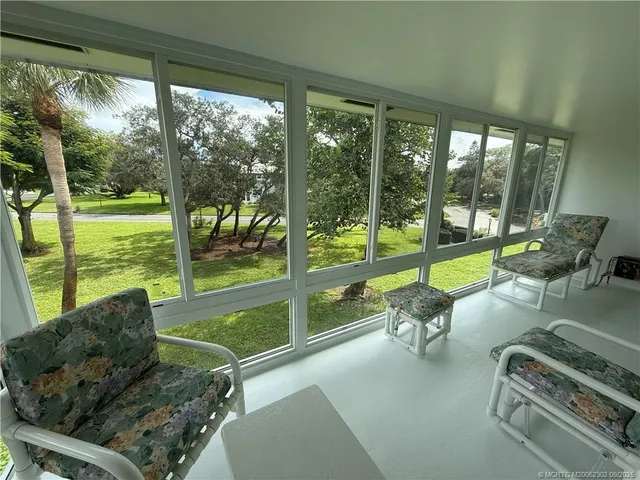 a building outdoor space with furniture and garden view