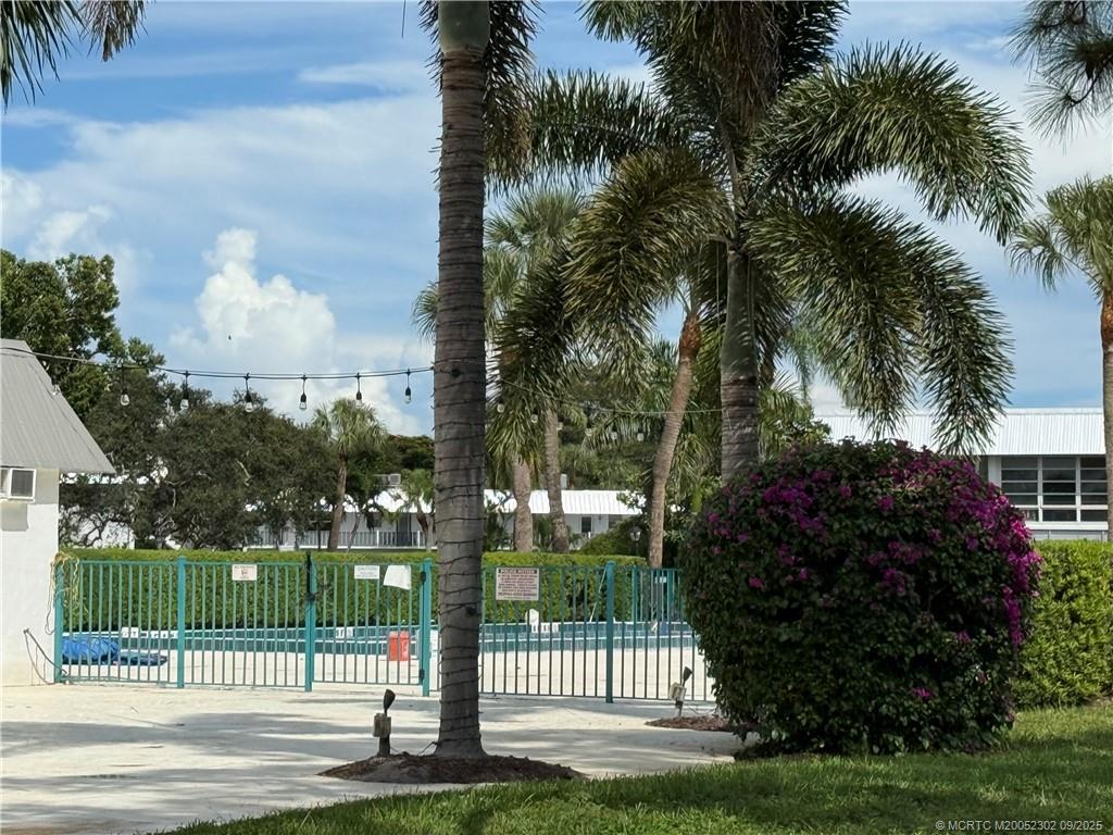 2929 Southeast Ocean Boulevard, Unit 8 Stuart, FL 34996 - Photo 22 of 22 a view of a garden from a park