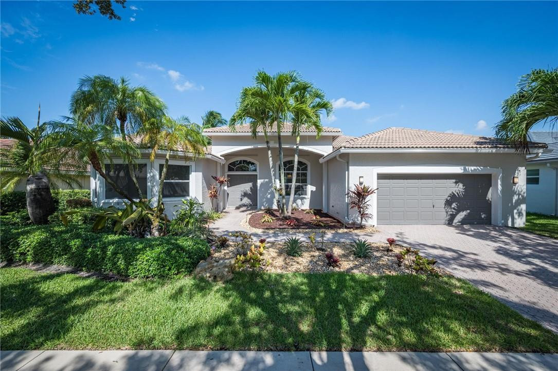 3759 Oak Ridge Circle Weston, FL 33331 - Photo 1 of 31 a view of a house with a patio
