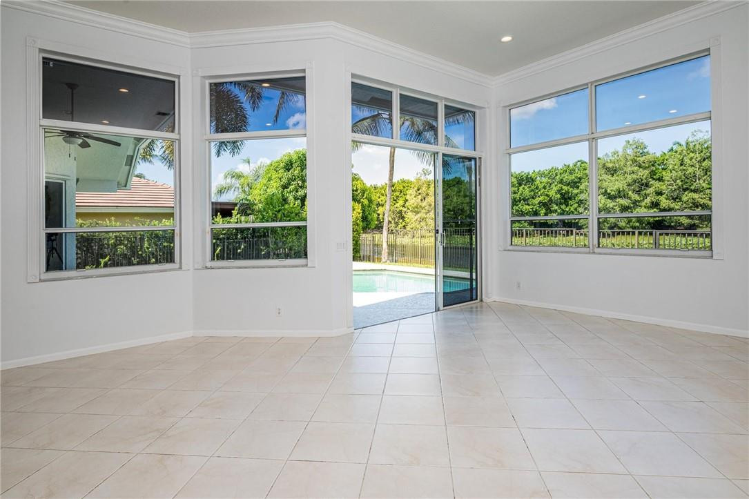 3759 Oak Ridge Circle Weston, FL 33331 - Photo 20 of 31 a view of an empty room with a window