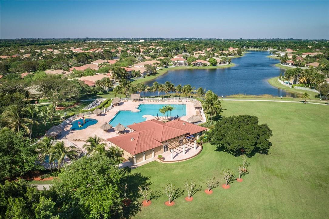 3759 Oak Ridge Circle Weston, FL 33331 - Photo 29 of 31 an aerial view of residential houses with outdoor space