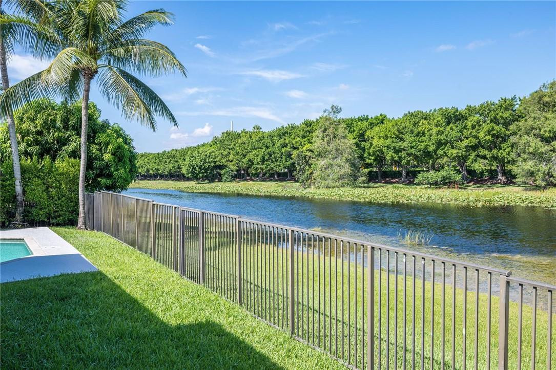 3759 Oak Ridge Circle Weston, FL 33331 - Photo 5 of 31 a view of a garden with a lake
