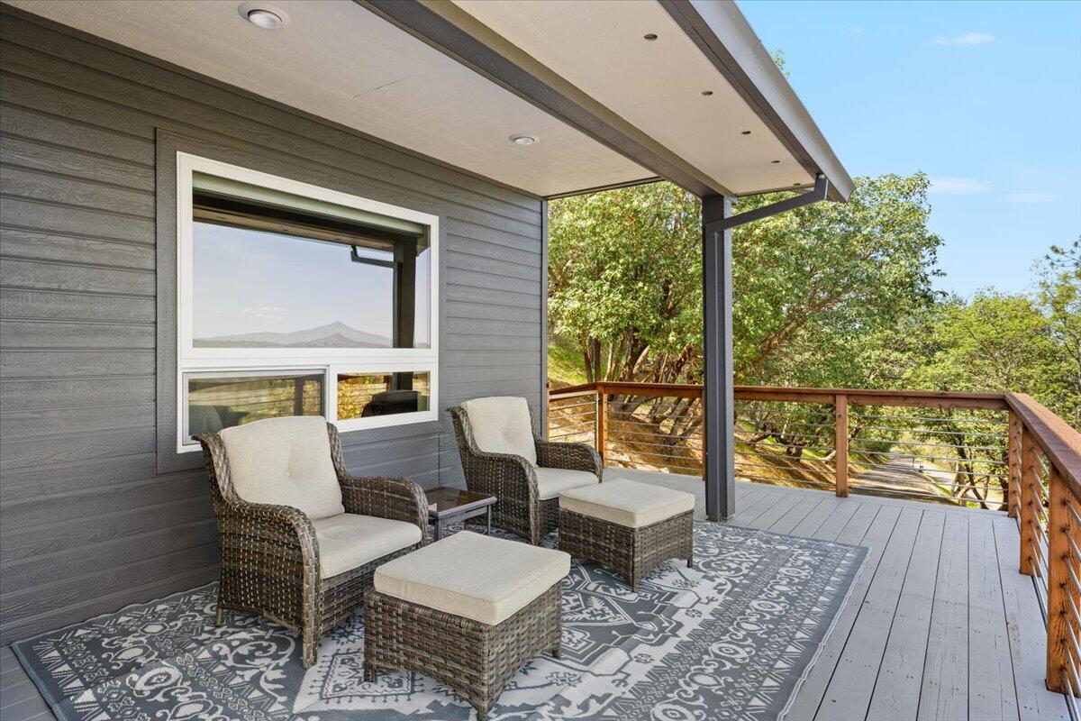 5229 Pioneer Road Medford, OR 97501 - Photo 48 of 62 Deck seating outside the primary suite.