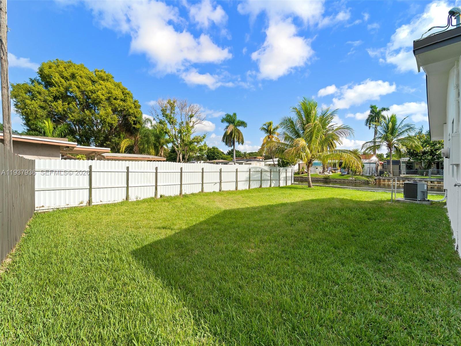 212 Southwest 7th Street Hallandale Beach, FL 33009 - Photo 19 of 23 a view of garden