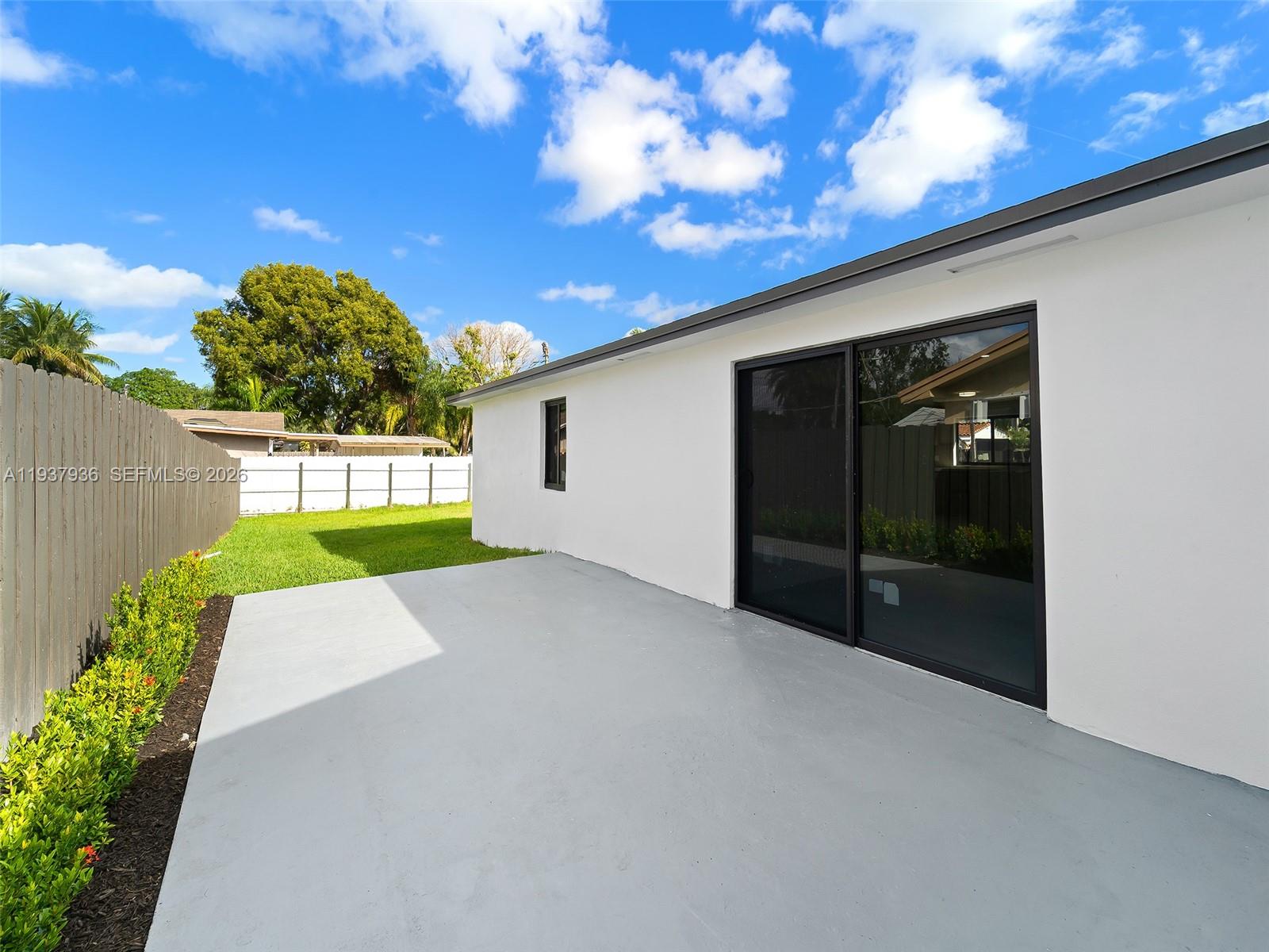 212 Southwest 7th Street Hallandale Beach, FL 33009 - Photo 21 of 23 a view of backyard with garden
