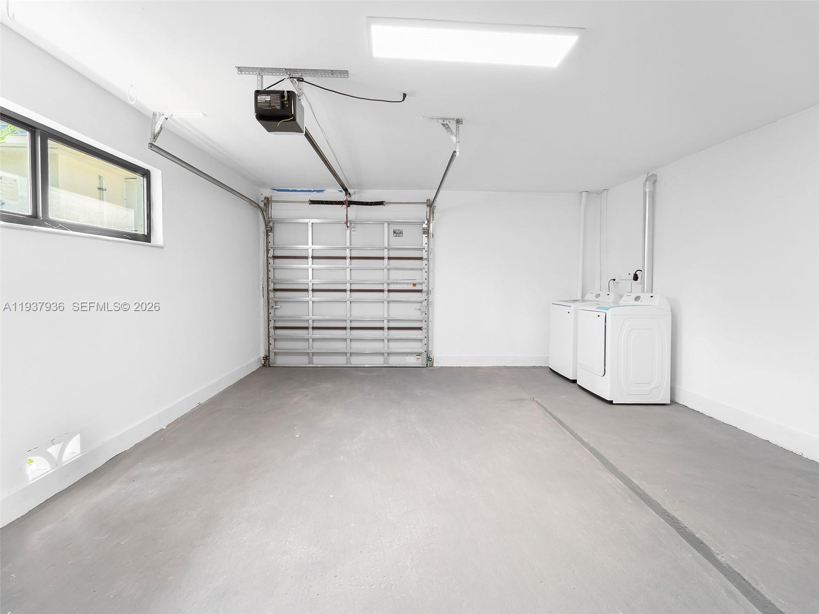 212 Southwest 7th Street Hallandale Beach, FL 33009 - Photo 23 of 23 a view of a garage room