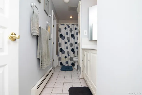 a bathroom with a toilet and a sink