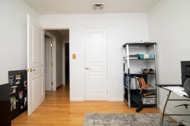 a view of a workspace with furniture