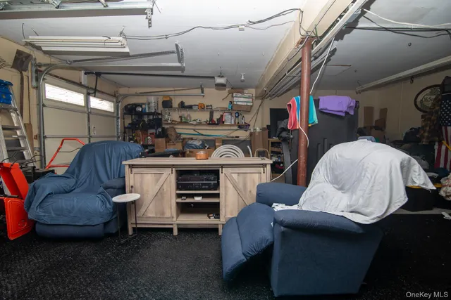 a view of a house with swimming pool and garden