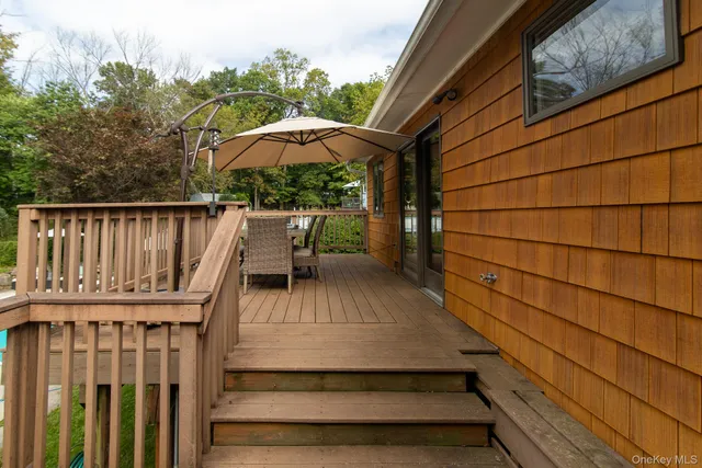 a view of a field with trees