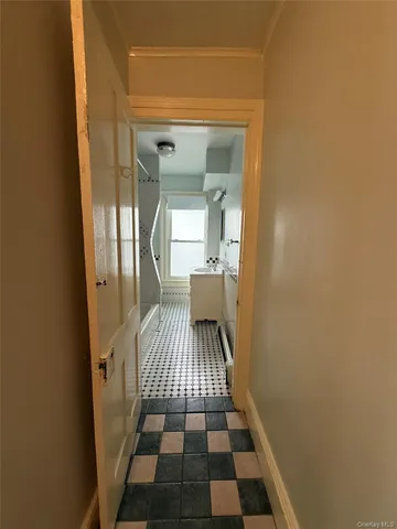 a view of a bedroom from a hallway