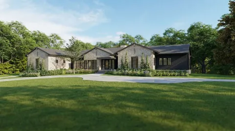 a front view of a house with a garden and porch