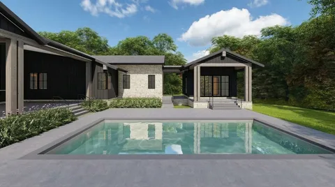 a front view of a house with yard