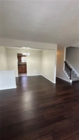 a view of livingroom and hardwood floor