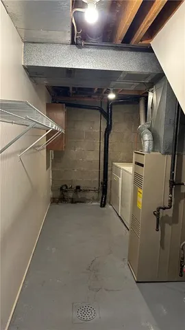 a view of a storage & utility room with washer and dryer
