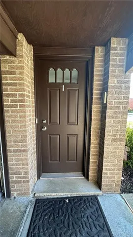 a view of a entryway door of the house
