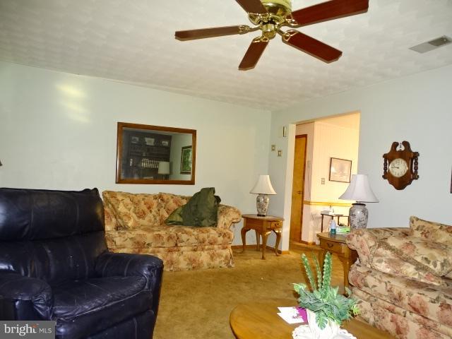 2281 Blackberry Road Dover, PA 17315 - Photo 12 of 29 a living room with furniture and a wooden floor