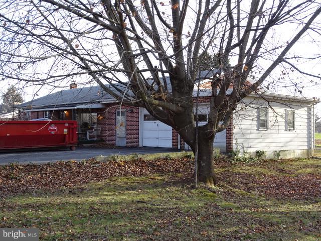 2281 Blackberry Road Dover, PA 17315 - Photo 8 of 29 a front view of a house with garden