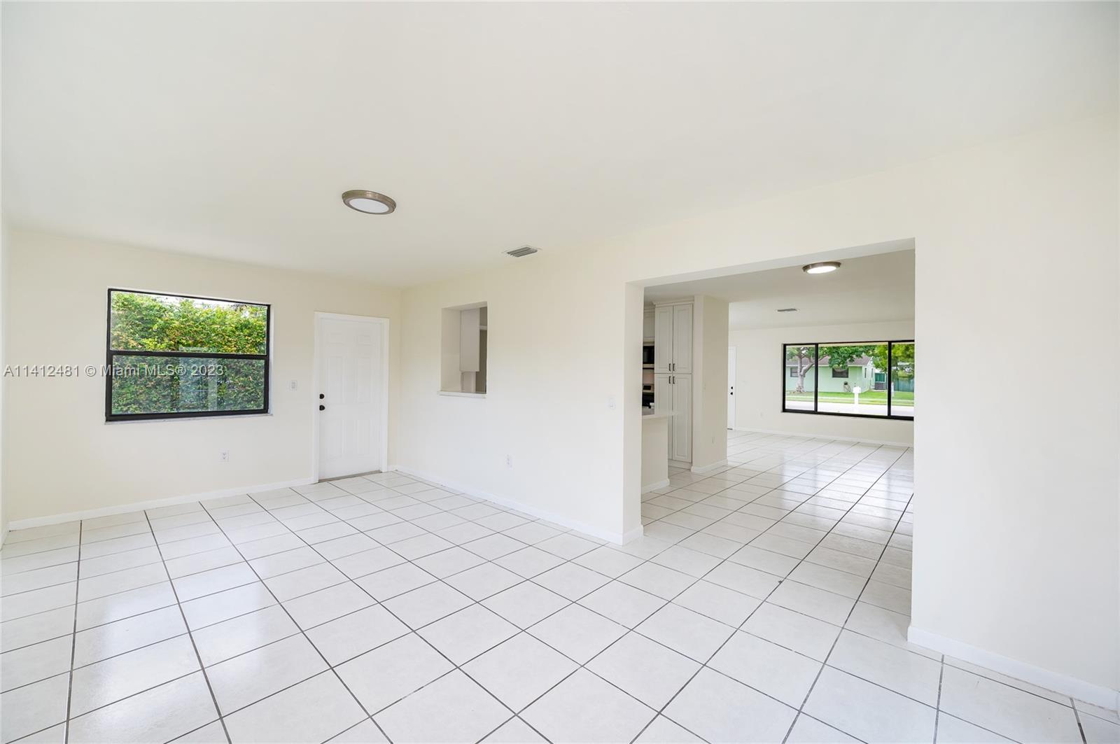 532 Northwest 15th Street Homestead, FL 33030 - Photo 13 of 32 a view of an empty room and window