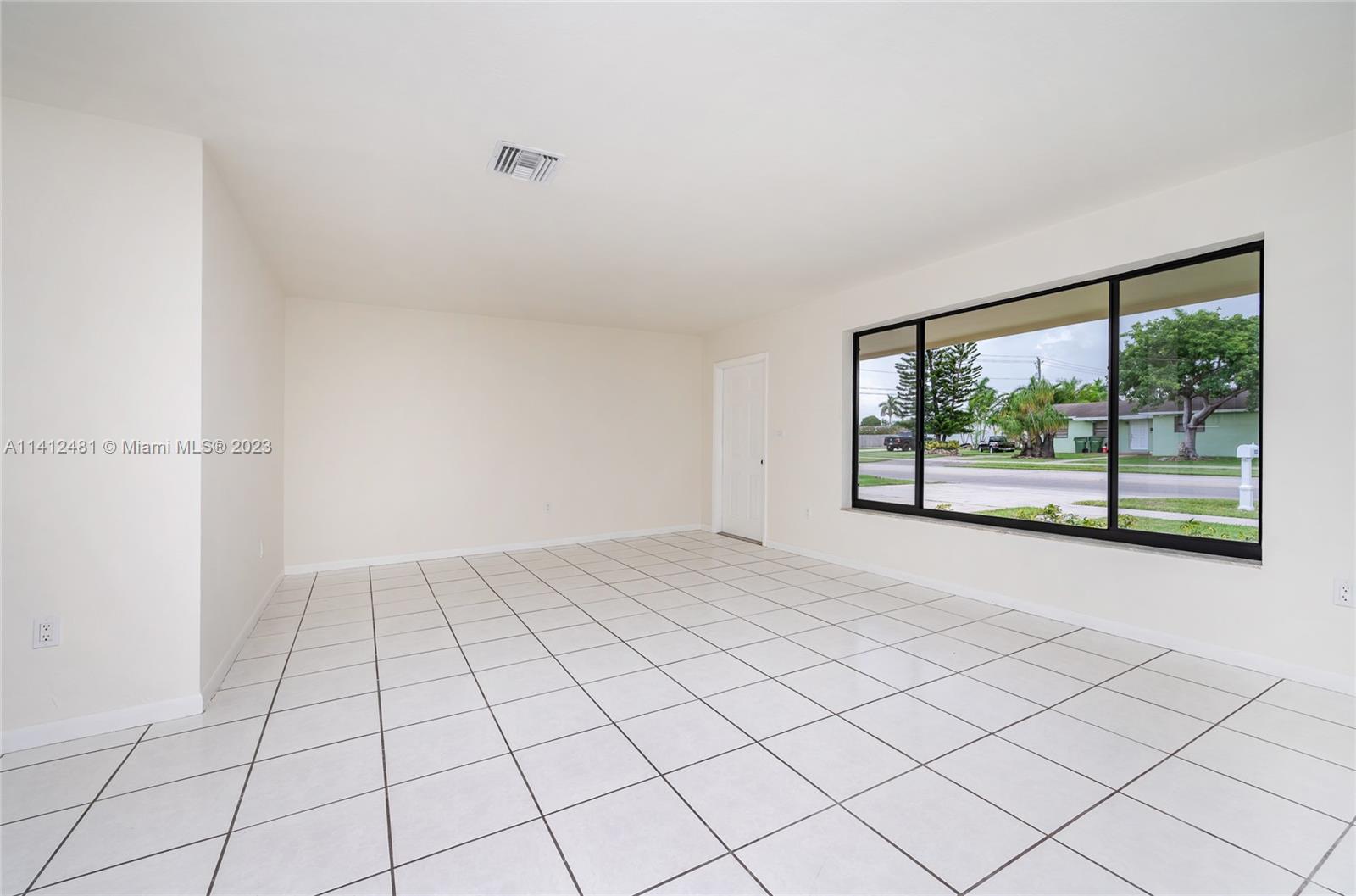 532 Northwest 15th Street Homestead, FL 33030 - Photo 20 of 32 a view of an empty room with a window