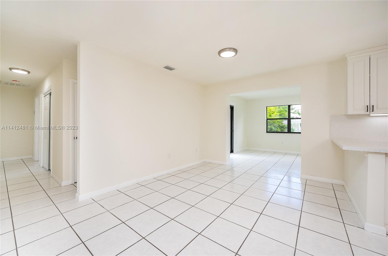 532 Northwest 15th Street Homestead, FL 33030 - Photo 21 of 32 a view of an empty room and window