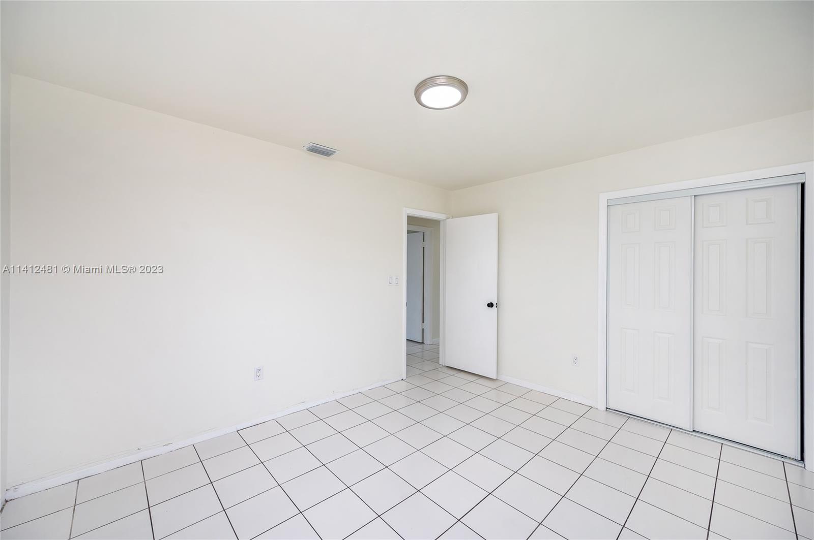 532 Northwest 15th Street Homestead, FL 33030 - Photo 26 of 32 a view of an empty room