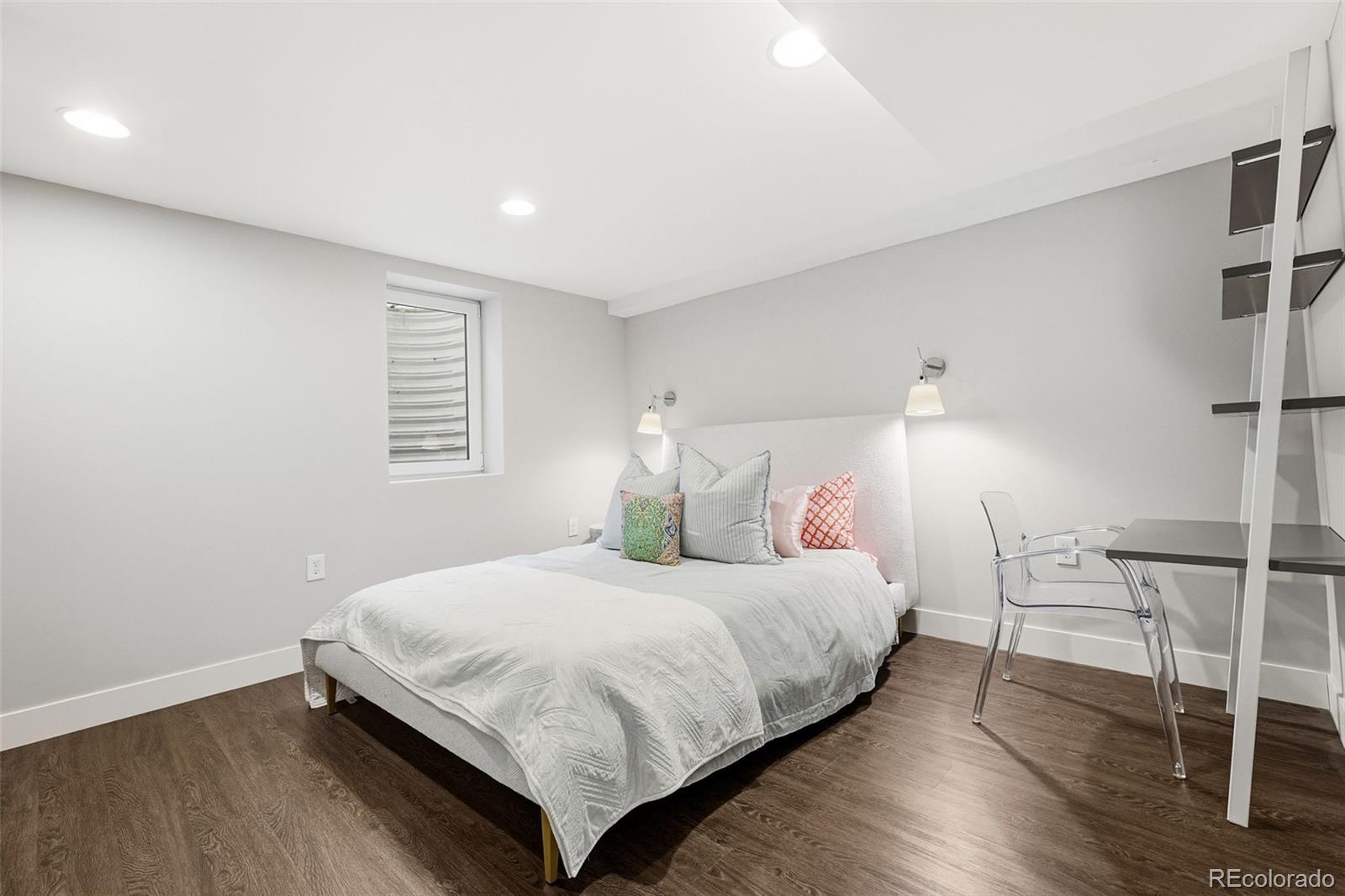 5320 Vale Drive Denver, CO 80246 - Photo 29 of 47 a bedroom with a bed and window