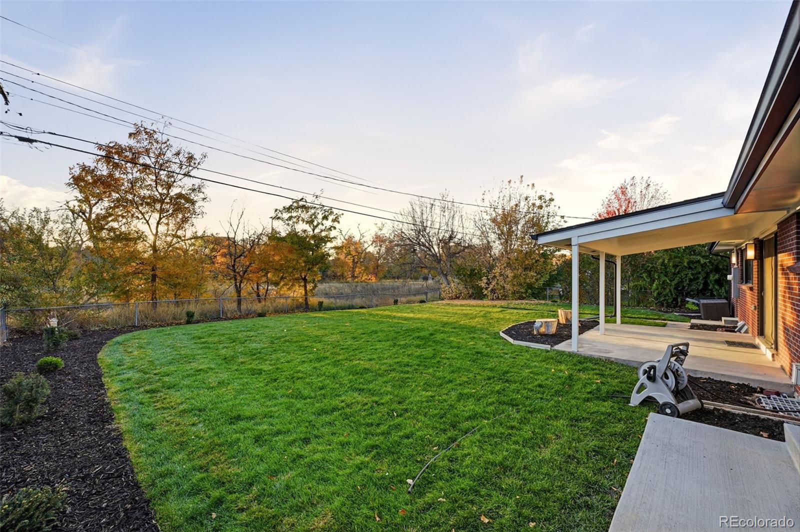 5320 Vale Drive Denver, CO 80246 - Photo 38 of 47 a view of a backyard with sitting area