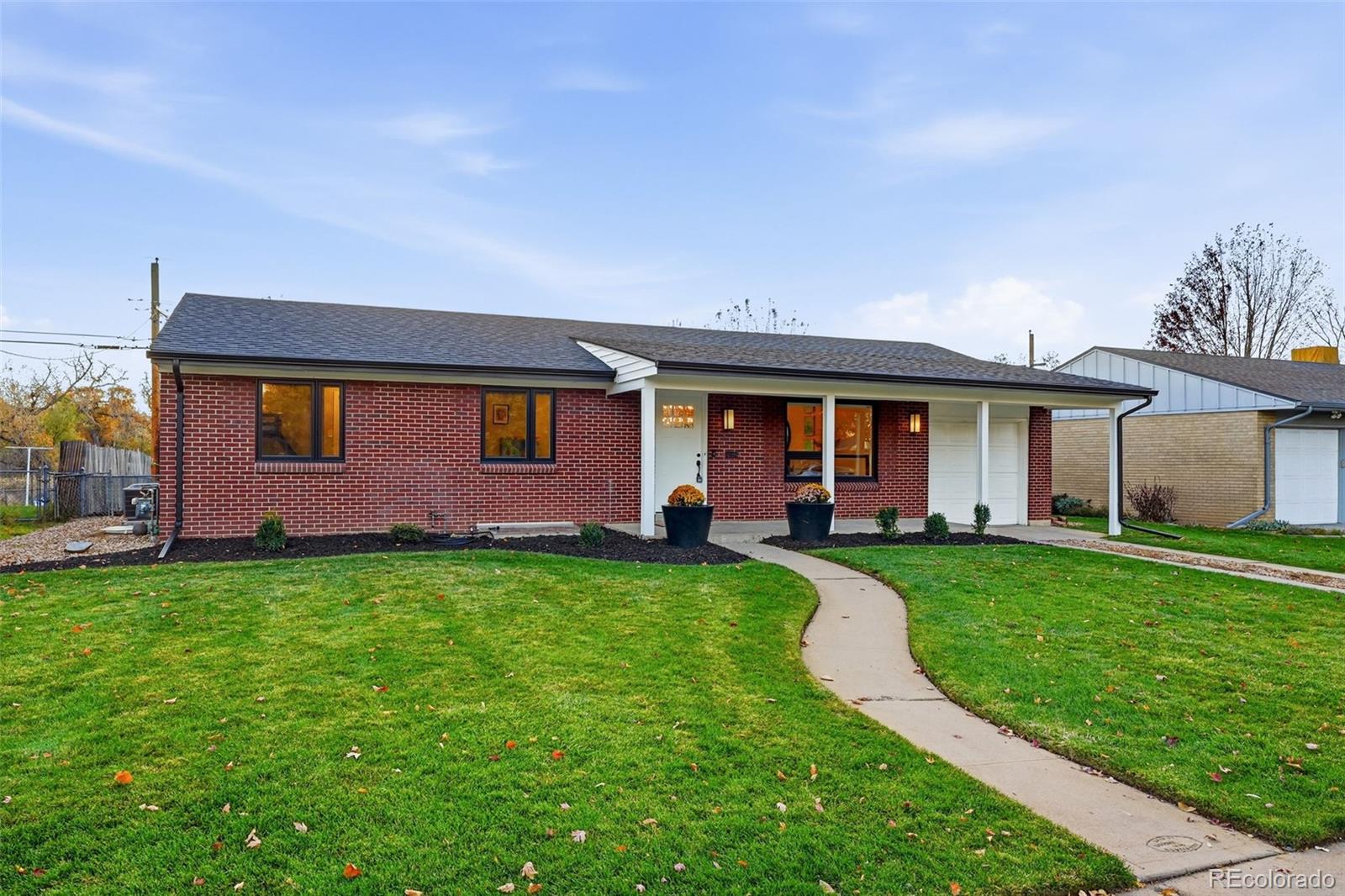 5320 Vale Drive Denver, CO 80246 - Photo 43 of 47 a view of a house with a backyard