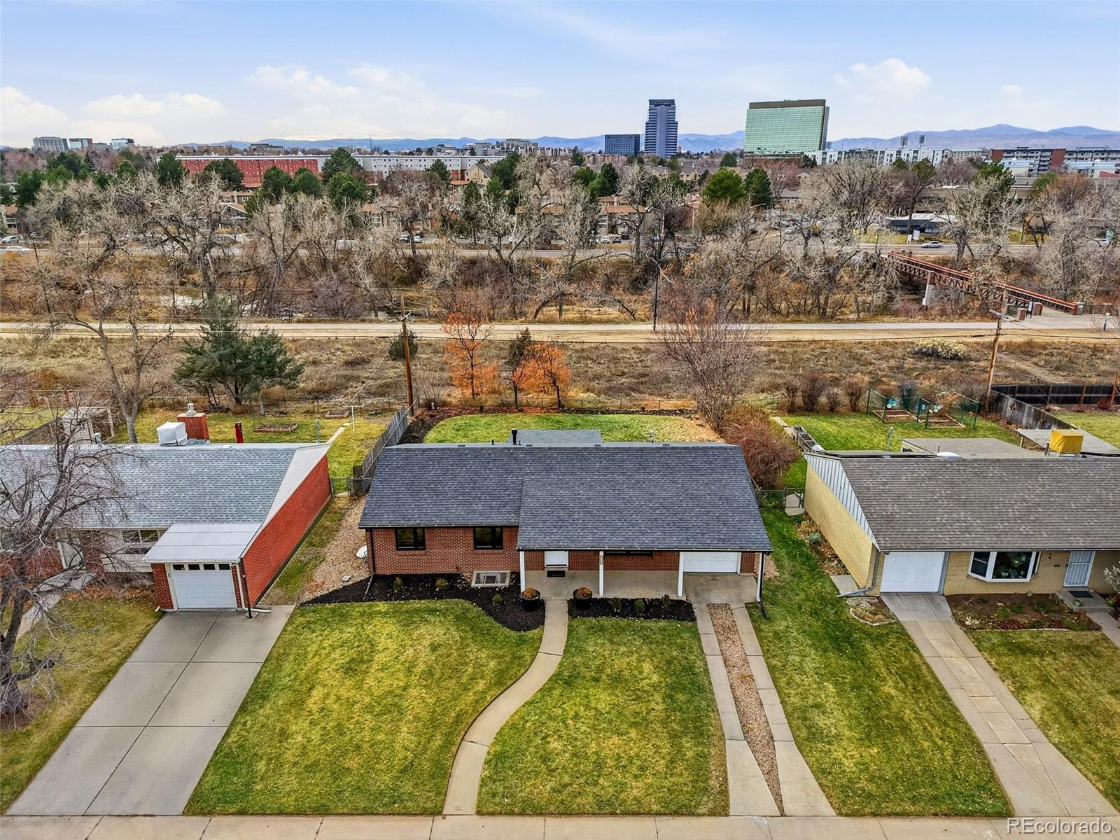 5320 Vale Drive Denver, CO 80246 - Photo 44 of 47 an aerial view of a house with swimming pool and ocean view