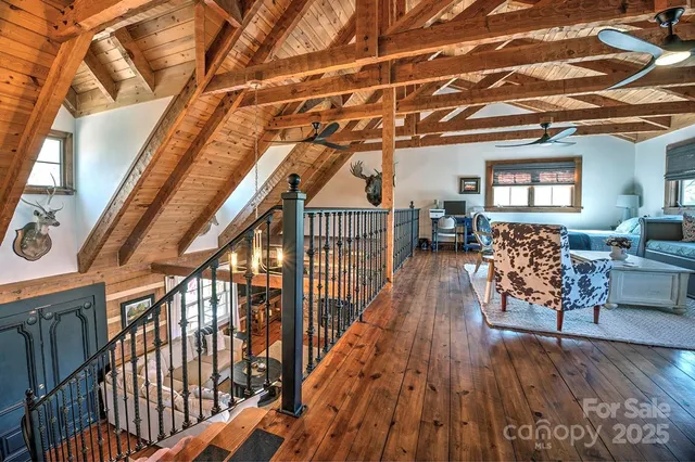a view of an entryway with wooden floor