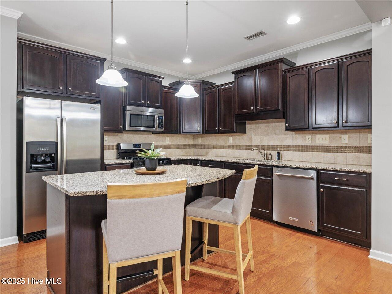 2459 Memory Ridge Drive Raleigh, NC 27606 - Photo 5 of 38 12-Kitchen